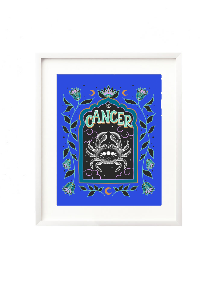 A framed art print - the illustration is a depiction of the Cancer zodiac sign. The celestial crab is illustrated floating in a starry night sky, surrounded by whimsical clouds and framed in by folk art flowers. Cancer is hand lettered at the top in a bold, groovy, retro inspired style.